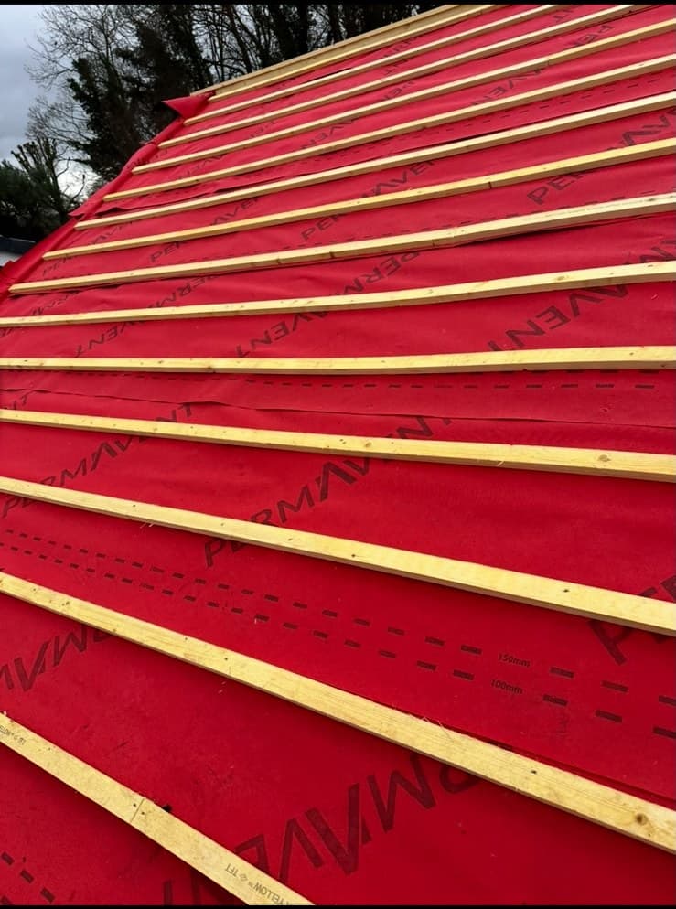 Red Marley felt and timber battens laid out on roof