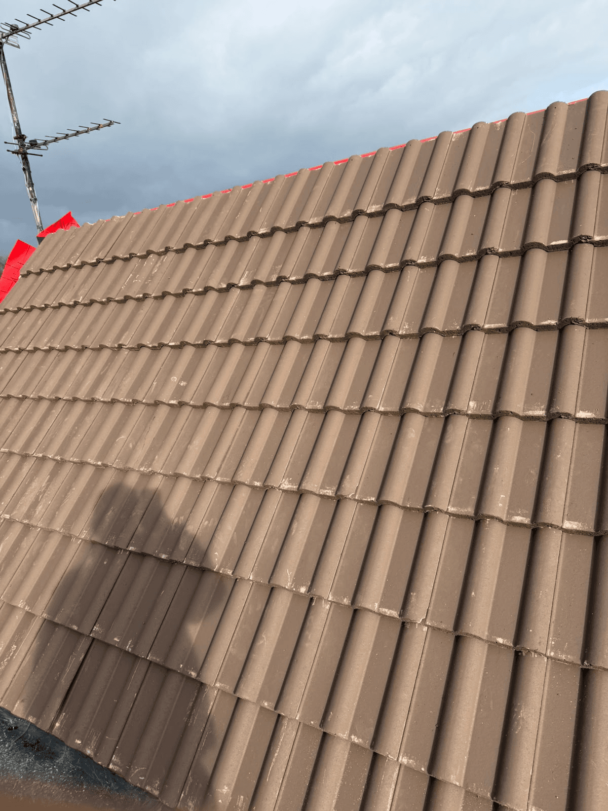 Completed brown tile roof