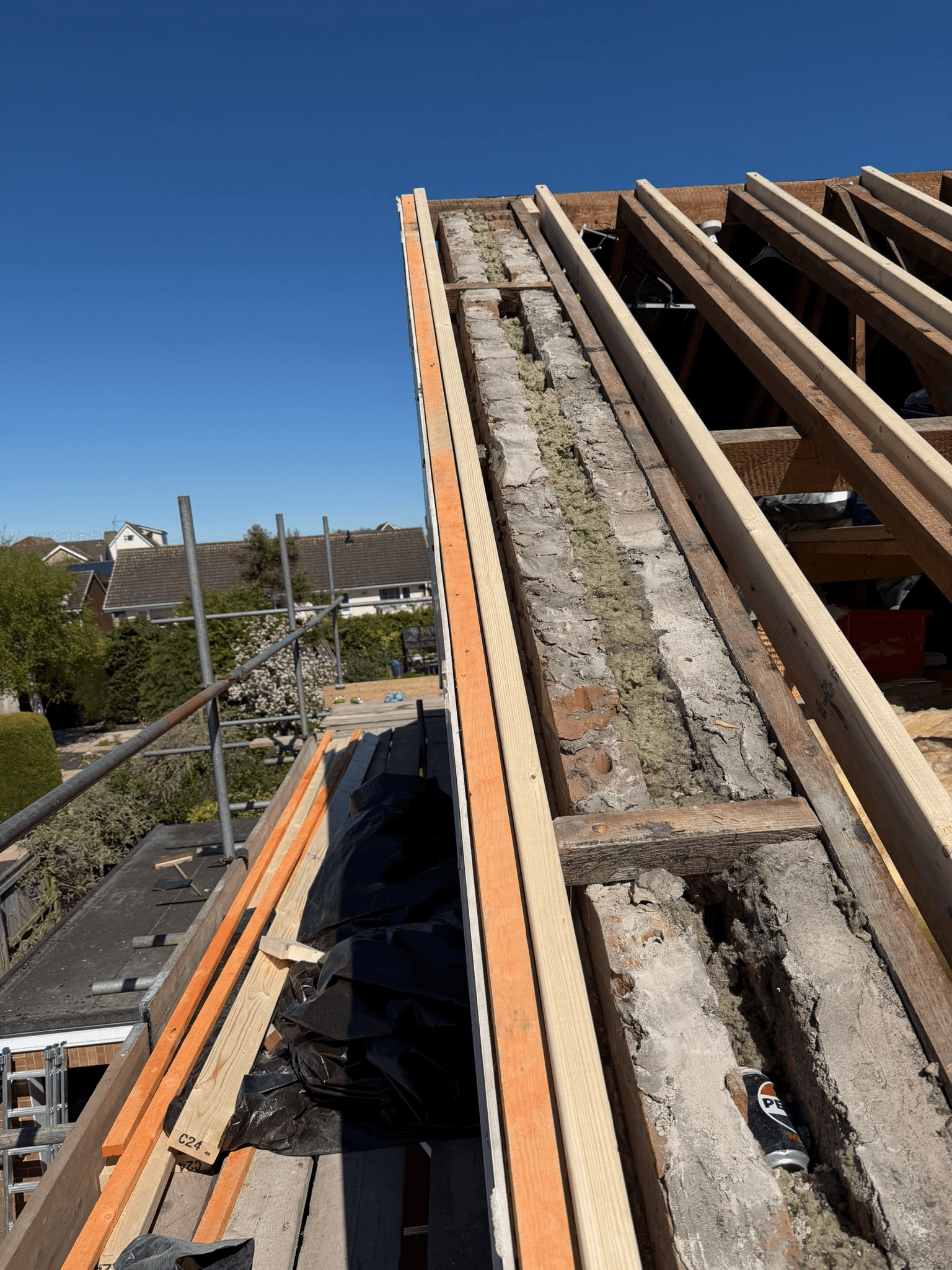 Roof structure and timber framework exposed